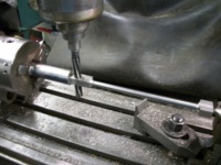 Also drilling and reaming the small end bearing hole.